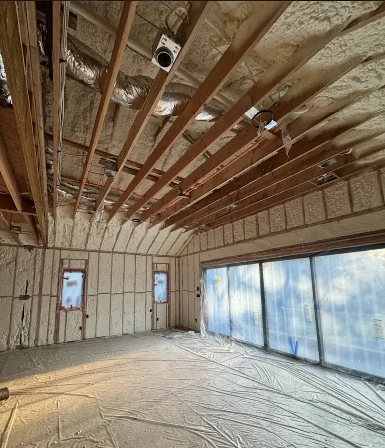 Interior walls and ceiling insulated with spray foam during new construction in Lake of the Woods